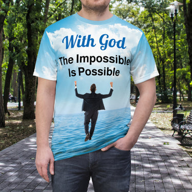 Soft, breathable activewear shirt with “Impossible Man” design, message “The Impossible Is Possible with God,” spiritual shirt for men pursuing God's unexpected possibilities, man wearing shirt
